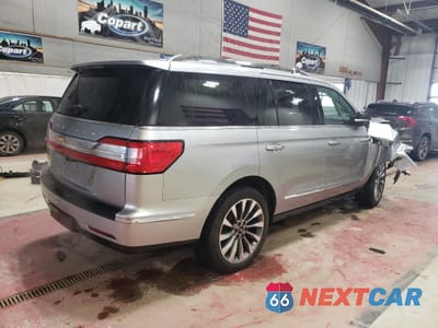 Trzecie zdjęcie samochodu z tyłu: 2020 LINCOLN NAVIGATOR RESERVE VIN:5LMJJ2LT6LEL17168 - miniatura