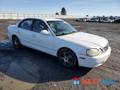 Czwarte zdjęcie samochodu z boku: 2005 KIA OPTIMA LX VIN:KNAGD126655382519 - miniatura