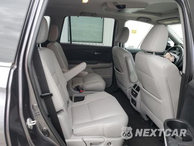Zdjęcie 11 z 14 samochodu: 2019 HONDA PILOT TOURING VIN:5FNYF5H61KB007759 - miniatura