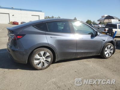 Trzecie zdjęcie samochodu z tyłu: 2023 TESLA MODEL Y VIN:7SAYGDED1PF934944 - miniatura
