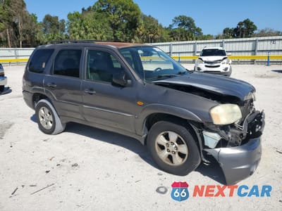 Czwarte zdjęcie samochodu z boku: 2003 MAZDA TRIBUTE ES VIN:4F2CZ06143KM32909 - miniatura