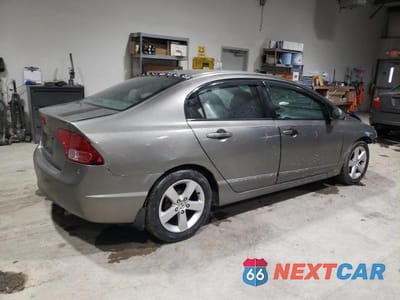Trzecie zdjęcie samochodu z tyłu: 2006 HONDA CIVIC LX VIN:1HGFA165X6L052020 - miniatura