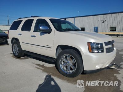 Czwarte zdjęcie samochodu z boku: 2013 CHEVROLET TAHOE C1500 LTZ VIN:1GNSCCE07DR300525 - miniatura
