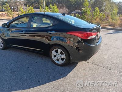 Trzecie zdjęcie samochodu z tyłu: 2013 HYUNDAI ELANTRA GLS VIN:KMHDH4AE5DU602673 - miniatura