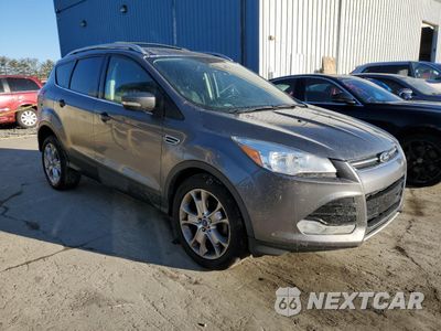 Czwarte zdjęcie samochodu z boku: 2014 FORD ESCAPE TITANIUM VIN:1FMCU0JX9EUC26987 - miniatura