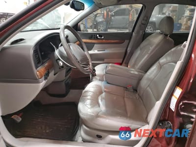 Zdjęcie 7 z 14 samochodu: 2002 LINCOLN CONTINENTAL VIN:1LNHM97V42Y687688 - miniatura