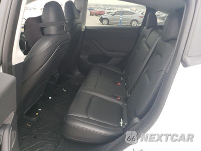 Zdjęcie 10 z 12 samochodu: 2023 TESLA MODEL Y VIN:7SAYGDEE6PA078787 - miniatura