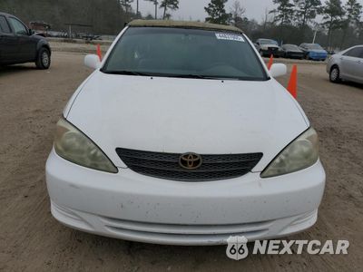 Piąte zdjęcie samochodu w środku: 2002 TOYOTA CAMRY LE VIN:4T1BE32K32U031079 - miniatura