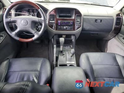 Zdjęcie 8 z 13 samochodu: 2002 MITSUBISHI MONTERO LIMITED VIN:JA4MW51R82J057774 - miniatura