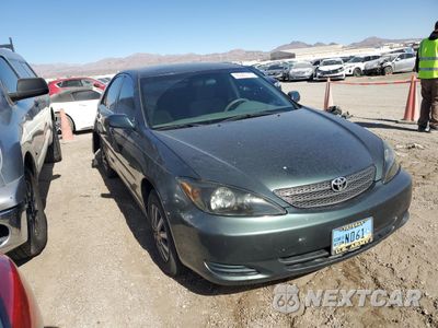 Czwarte zdjęcie samochodu z boku: 2002 TOYOTA CAMRY LE VIN:JTDBE32K120104901 - miniatura
