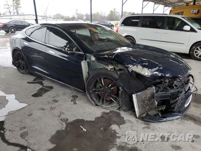 Czwarte zdjęcie samochodu z boku: 2014 TESLA MODEL S VIN:5YJSA1H15EFP43884 - miniatura