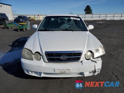 Piąte zdjęcie samochodu w środku: 2005 KIA OPTIMA LX VIN:KNAGD126655382519 - miniatura