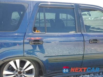 Zdjęcie 11 z 16 samochodu: 1999 HONDA CR-V LX VIN:JHLRD1840XC025968 - miniatura
