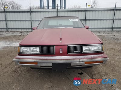 Piąte zdjęcie samochodu w środku: 1988 OLDSMOBILE DELTA 88 ROYALE BROUGHAM VIN:1G3HY54C0JW377388 - miniatura
