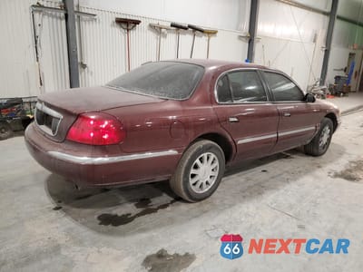 Trzecie zdjęcie samochodu z tyłu: 2002 LINCOLN CONTINENTAL VIN:1LNHM97V42Y687688 - miniatura