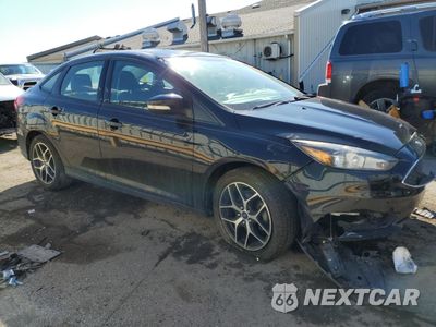 Czwarte zdjęcie samochodu z boku: 2017 FORD FOCUS SEL VIN:1FADP3H21HL279964 - miniatura