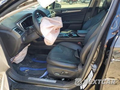 Zdjęcie 7 z 13 samochodu: 2015 FORD FUSION TITANIUM VIN:3FA6P0K9XFR157342 - miniatura