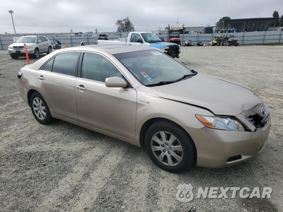 Czwarte zdjęcie samochodu z boku: 2007 TOYOTA CAMRY HYBRID VIN:JTNBB46K173019101 - miniatura