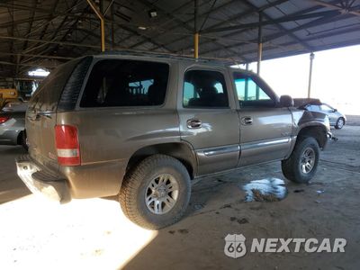 Trzecie zdjęcie samochodu z tyłu: 2003 GMC YUKON VIN:1GKEC13V43J341253 - miniatura
