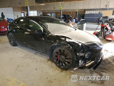 Czwarte zdjęcie samochodu z boku: 2021 TESLA MODEL 3 VIN:5YJ3E1EC5MF030822 - miniatura