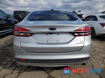 Zdjęcie 6 z 12 samochodu: 2018 FORD FUSION SE HYBRID VIN:3FA6P0LU7JR242523 - miniatura