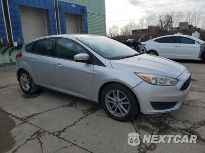 Czwarte zdjęcie samochodu z boku: 2017 FORD FOCUS SE VIN:1FADP3K26HL309243 - miniatura
