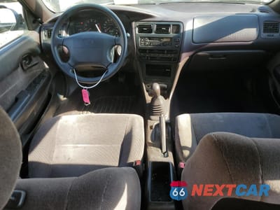 Zdjęcie 8 z 13 samochodu: 1994 TOYOTA COROLLA LE VIN:2T1AE09B7RC081818 - miniatura