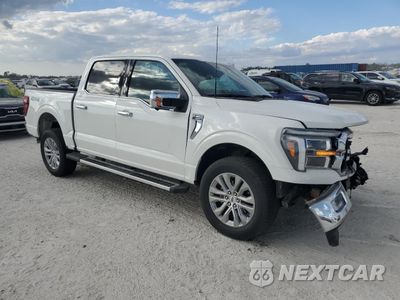 Czwarte zdjęcie samochodu z boku: 2024 FORD F150 LARIAT VIN:1FTFW5L81RFA66283 - miniatura