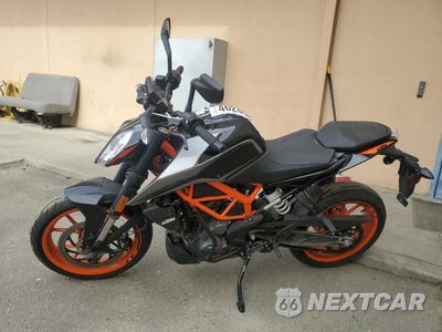 Trzecie zdjęcie samochodu z tyłu: 2022 KTM 390 DUKE VIN:MD2JPJ408NC253292 - miniatura