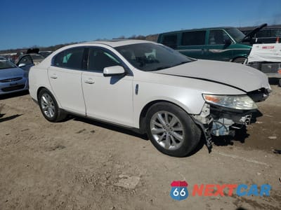 Czwarte zdjęcie samochodu z boku: 2011 LINCOLN MKS VIN:1LNHL9FT0BG610437 - miniatura