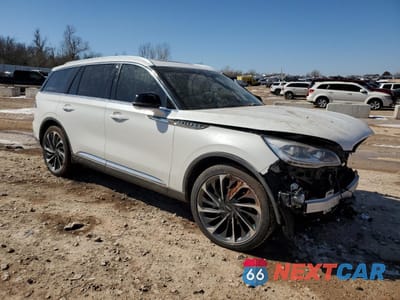 Czwarte zdjęcie samochodu z boku: 2020 LINCOLN AVIATOR RESERVE VIN:5LM5J7XC8LGL11059 - miniatura