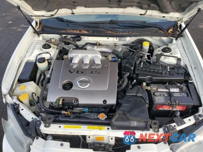 Zdjęcie 11 z 12 samochodu: 2003 NISSAN MAXIMA GLE VIN:JN1DA31A73T439600 - miniatura