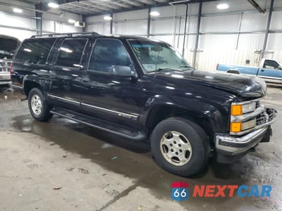 Czwarte zdjęcie samochodu z boku: 1997 CHEVROLET SUBURBAN K1500 VIN:3GNFK16R3VG192816 - miniatura