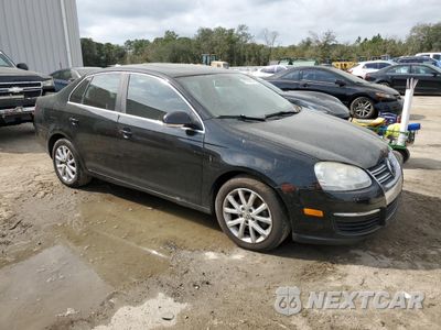 Czwarte zdjęcie samochodu z boku: 2010 VOLKSWAGEN JETTA SE VIN:3VWRX7AJ4AM037745 - miniatura