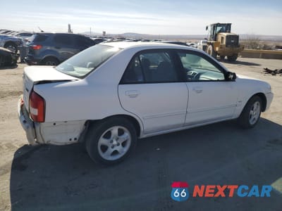 Trzecie zdjęcie samochodu z tyłu: 1999 MAZDA PROTEGE ES VIN:JM1BJ2213X0121378 - miniatura