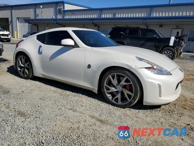 Czwarte zdjęcie samochodu z boku: 2017 NISSAN 370Z BASE VIN:JN1AZ4EHXHM954343 - miniatura