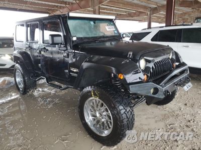 Czwarte zdjęcie samochodu z boku: 2008 JEEP WRANGLER UNLIMITED SAHARA VIN:1J8GB59118L589452 - miniatura