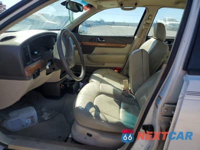 Zdjęcie 7 z 13 samochodu: 2000 LINCOLN CONTINENTAL VIN:1LNHM97V2YY802541 - miniatura