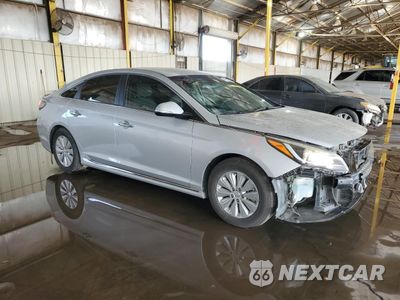 Czwarte zdjęcie samochodu z boku: 2016 HYUNDAI SONATA HYBRID VIN:KMHE24L12GA015160 - miniatura