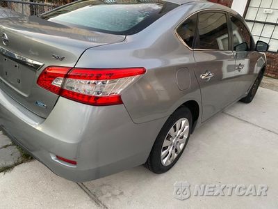 Czwarte zdjęcie samochodu z boku: 2013 NISSAN SENTRA S VIN:3N1AB7AP9DL742055 - miniatura
