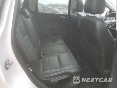 Zdjęcie 11 z 15 samochodu: 2014 FORD ESCAPE TITANIUM VIN:1FMCU0JX6EUE11072 - miniatura