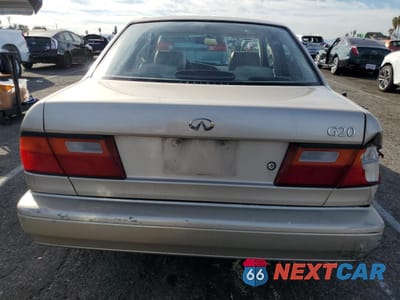 Zdjęcie 6 z 14 samochodu: 1996 INFINITI G20 VIN:JNKCP01D9TT534495 - miniatura