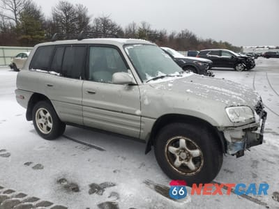 Czwarte zdjęcie samochodu z boku: 1999 TOYOTA RAV4 VIN:JT3GP10V8X7049397 - miniatura