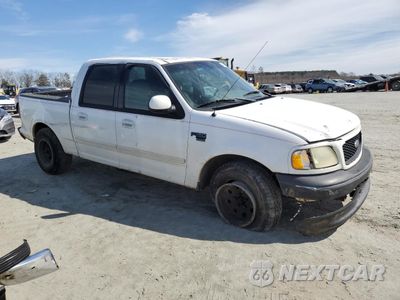 Czwarte zdjęcie samochodu z boku: 2001 FORD F150 SUPERCREW VIN:1FTRW07L01KC14157 - miniatura