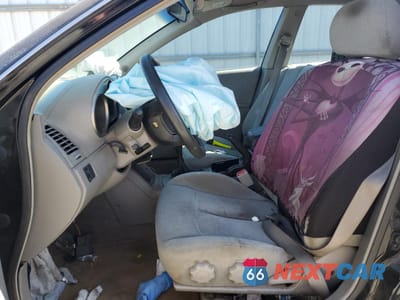 Zdjęcie 7 z 12 samochodu: 2003 NISSAN ALTIMA BASE VIN:1N4AL11D03C129562 - miniatura