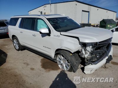 Czwarte zdjęcie samochodu z boku: 2021 CHEVROLET SUBURBAN K1500 HIGH COUNTRY VIN:1GNSKGKL6MR168642 - miniatura