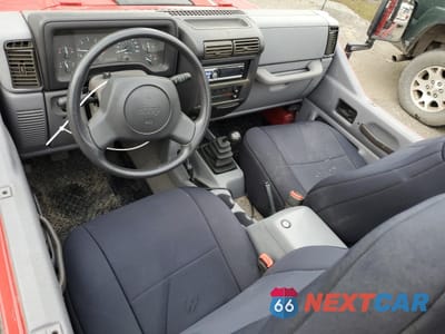 Zdjęcie 8 z 14 samochodu: 1997 JEEP WRANGLER / TJ SPORT VIN:1J4FY19S1VP446857 - miniatura