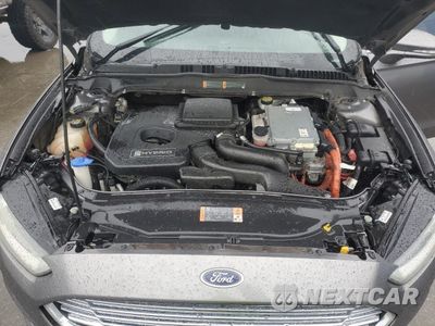 Zdjęcie 11 z 12 samochodu: 2014 FORD FUSION SE HYBRID VIN:3FA6P0LU6ER136666 - miniatura