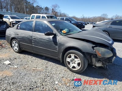 Czwarte zdjęcie samochodu z boku: 2003 NISSAN ALTIMA BASE VIN:1N4AL11D03C129562 - miniatura