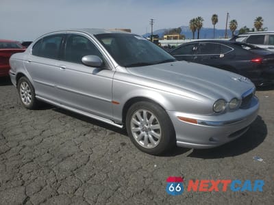 Czwarte zdjęcie samochodu z boku: 2003 JAGUAR X-TYPE 2.5 VIN:SAJEA51DX3XD48180 - miniatura